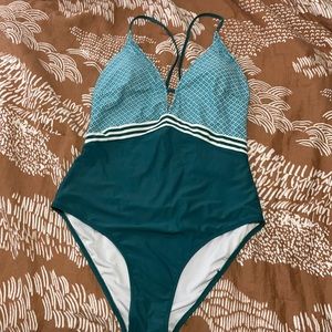 Teal patterned one piece swimsuit